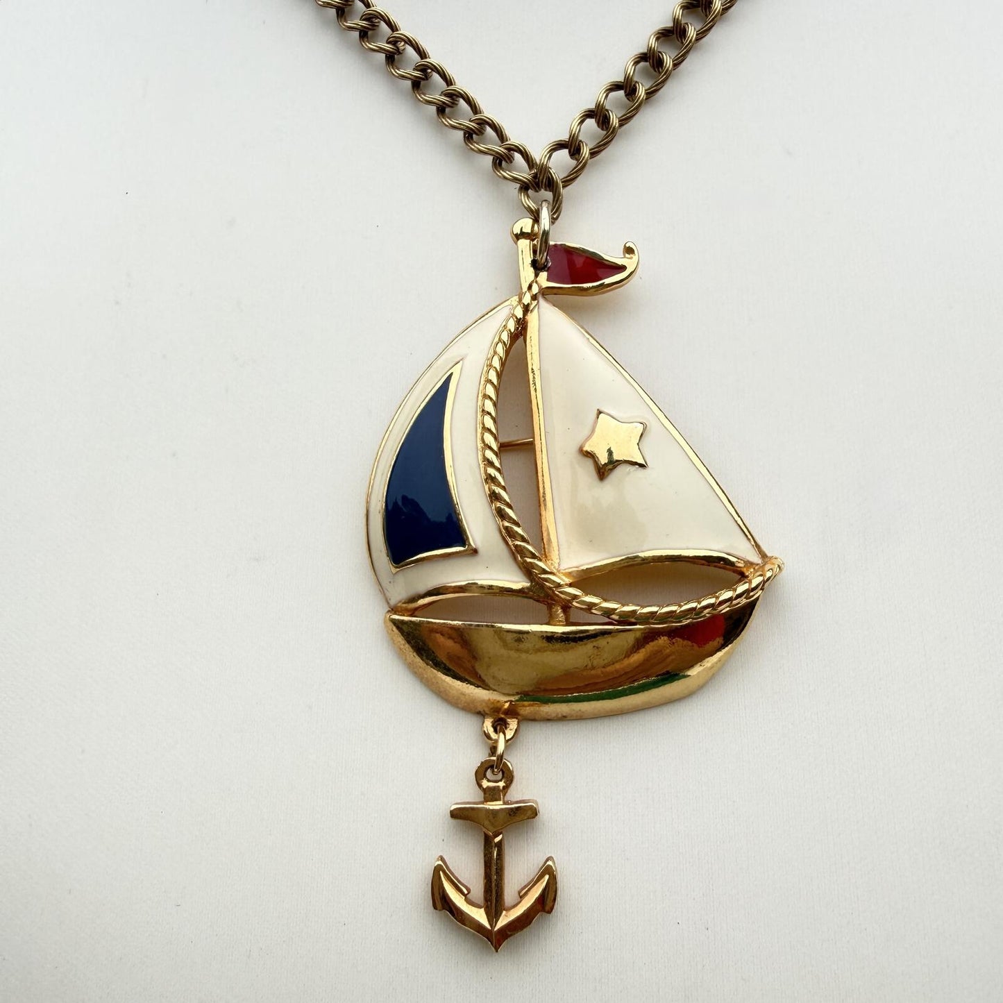 Vintage Avon Signed. Patriotic Sail Boat with Anchor Pendant.